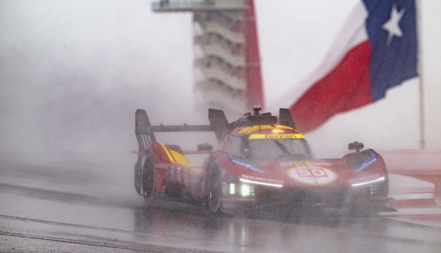 Ferrari 499P in the rain
